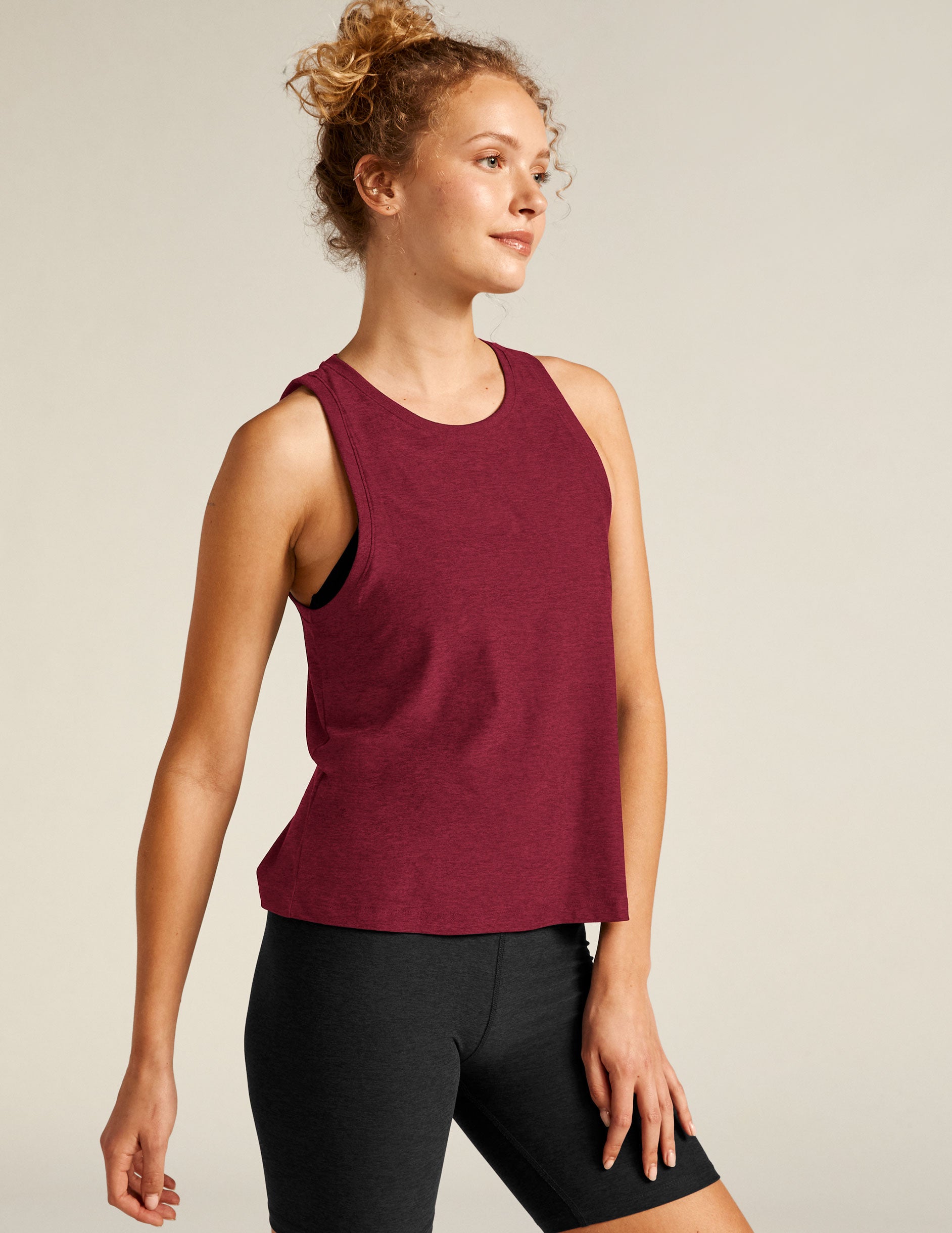 red high front neckline tank top with a relaxed fit.
