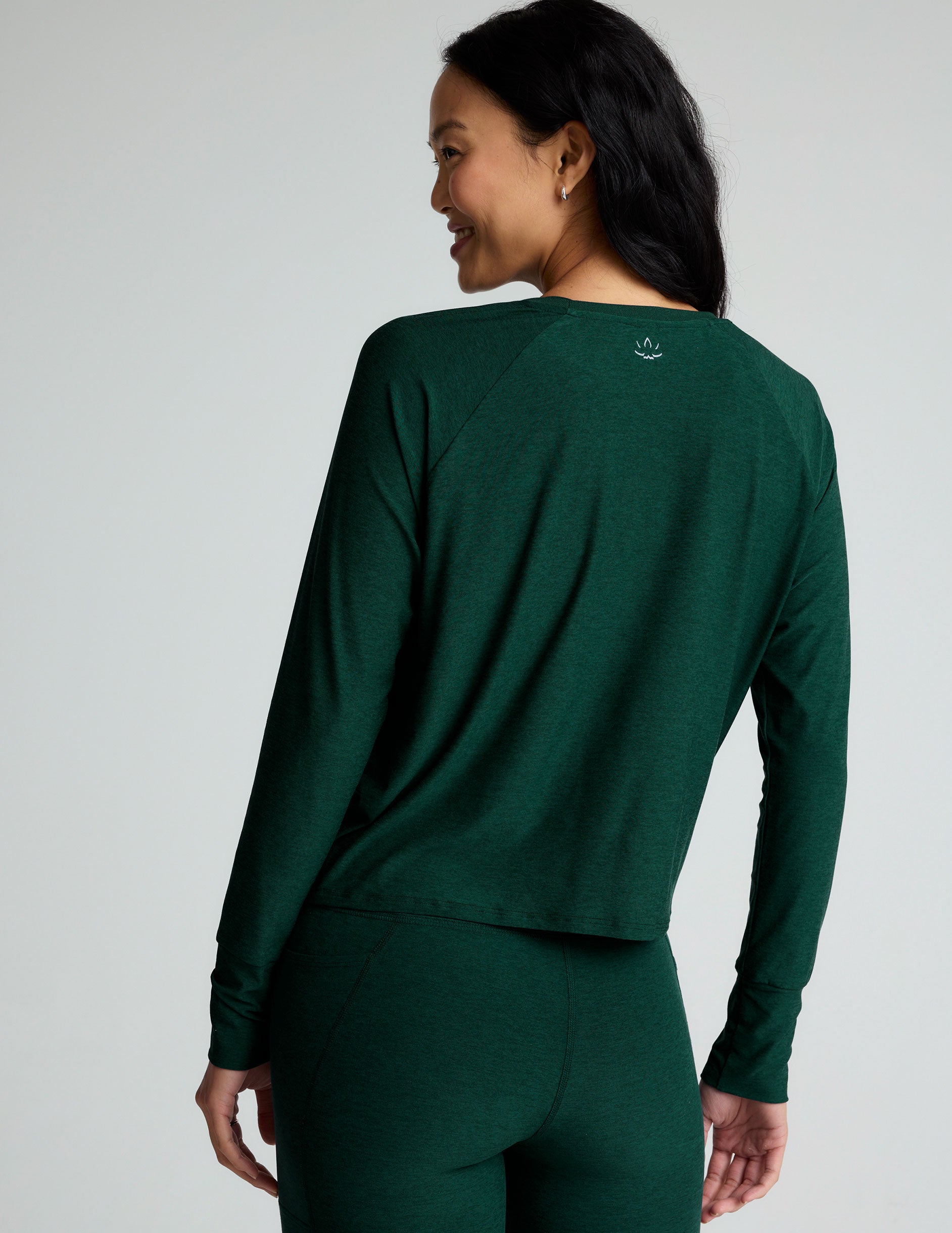 green scoop neck long sleeve lightweight top.