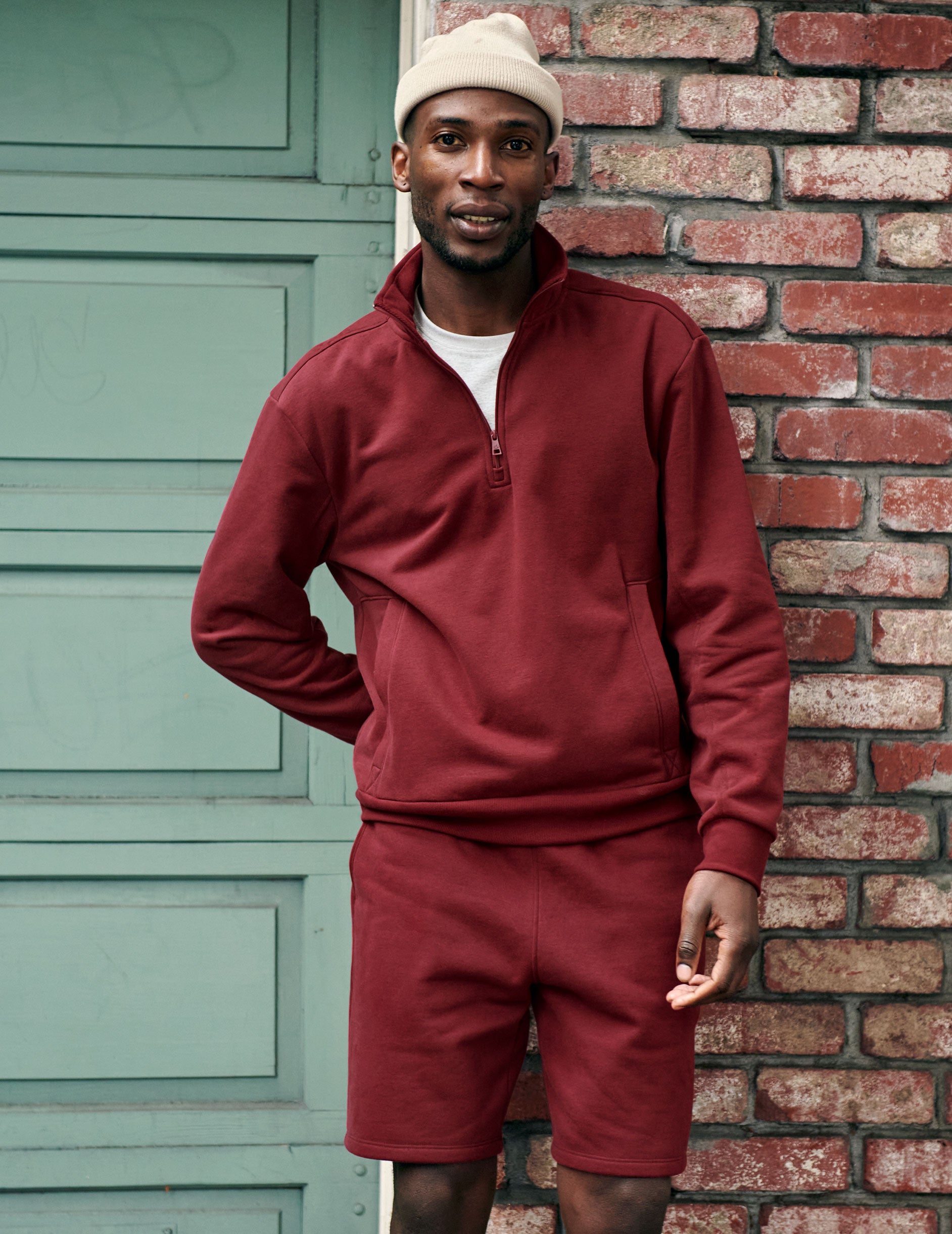 red men's quarter zip pullover with a kangaroo pocket.