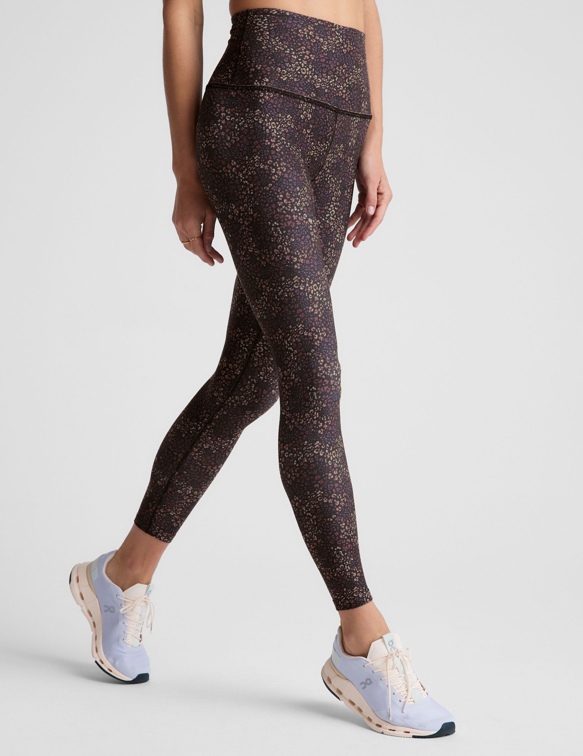 leopard printed high-waisted midi length leggings.