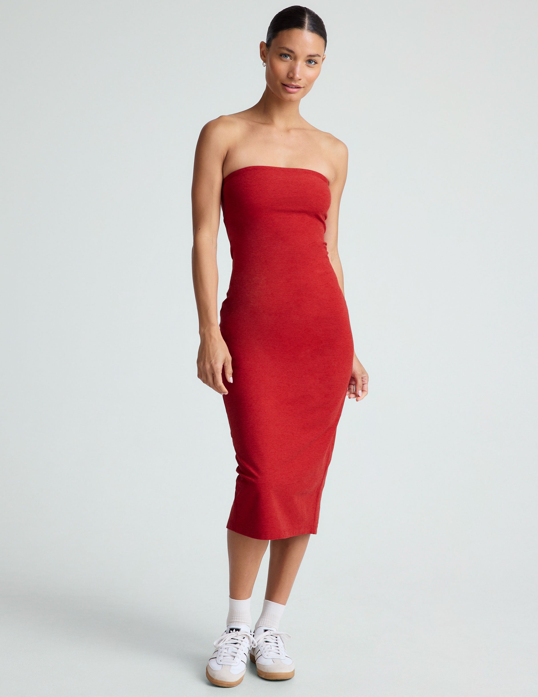 red strapless midi dress with a back slit.