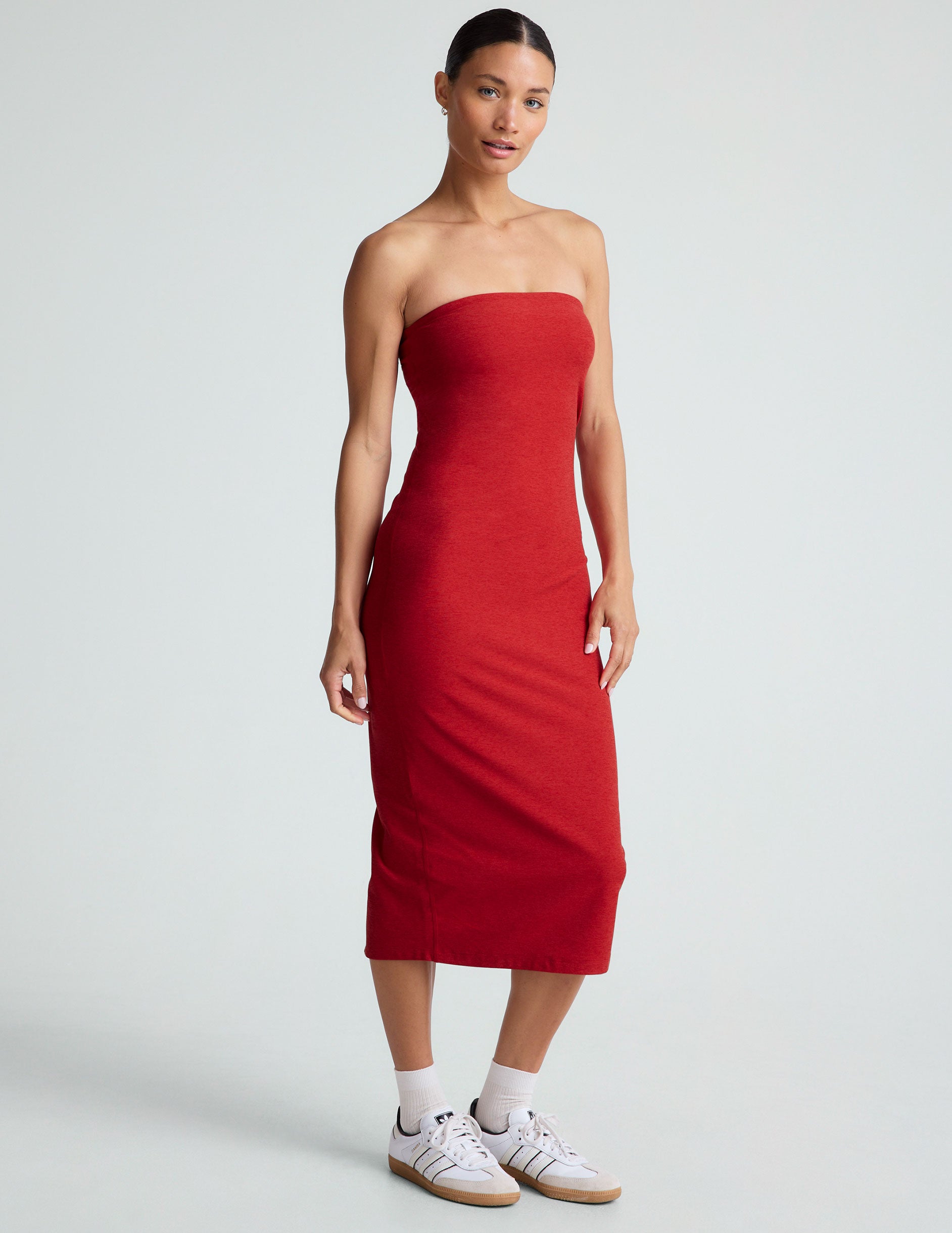 red strapless midi dress with a back slit.