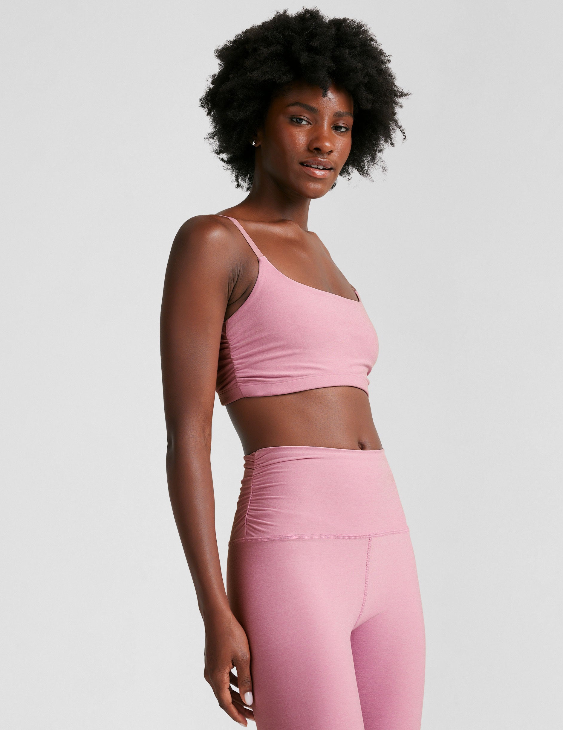 pink bra with adjustable straps and shirred detailing on the side.